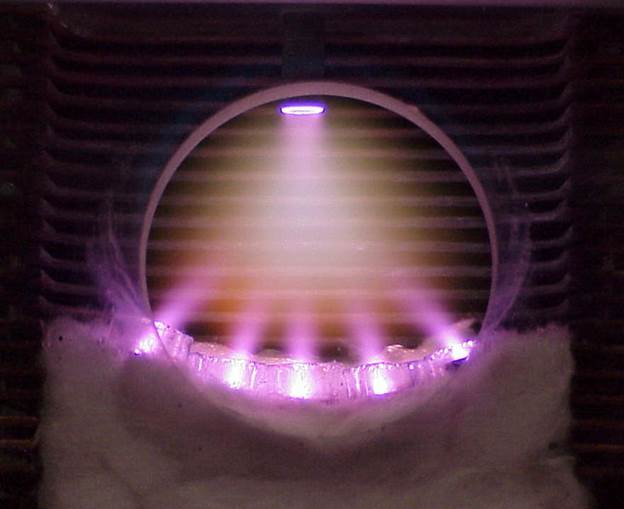 A picture containing kitchen appliance, appliance, oven, fireplace
Description automatically generated